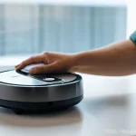 Home 22 가정용 로봇의 지속 가능한 사용 방법 - A focused, young adult (could be male or female) in casual, everyday clothing, meticulously cleaning...